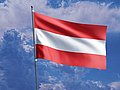 Die Flagge Österreichs an einem Fahnenmast.