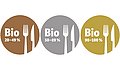Bio-Logo gültig ab 2023 für die Außer-Haus-Verpflegung. Das Logo zeigt Label in Bronze, Silber oder Gold je nach geldwertem Bio-Anteil im Verpflegungsangebot.